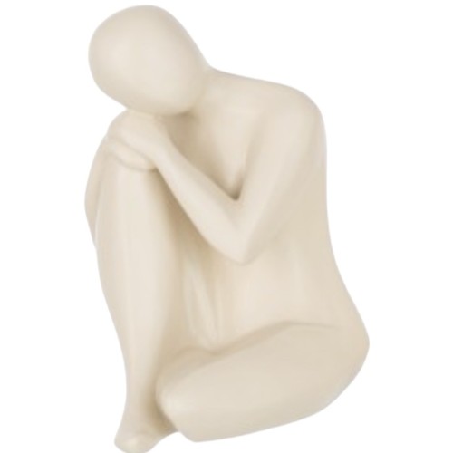 Figurine agenouillé